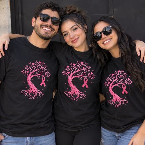Three people wearing black tees with a pink ribbon tree and heart-shaped leaves.